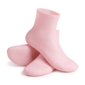 Pair of pink long silicone gel foot-care socks on a white background