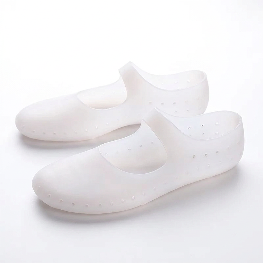 Side view of translucent white gel foot covers with closed toes and small perforations