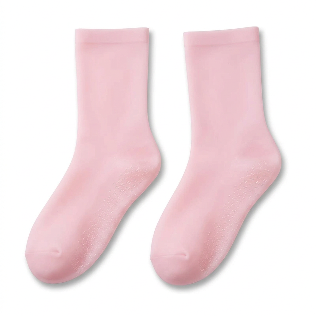 Top view of pink closed-toe gel foot-care socks with extended cuffs